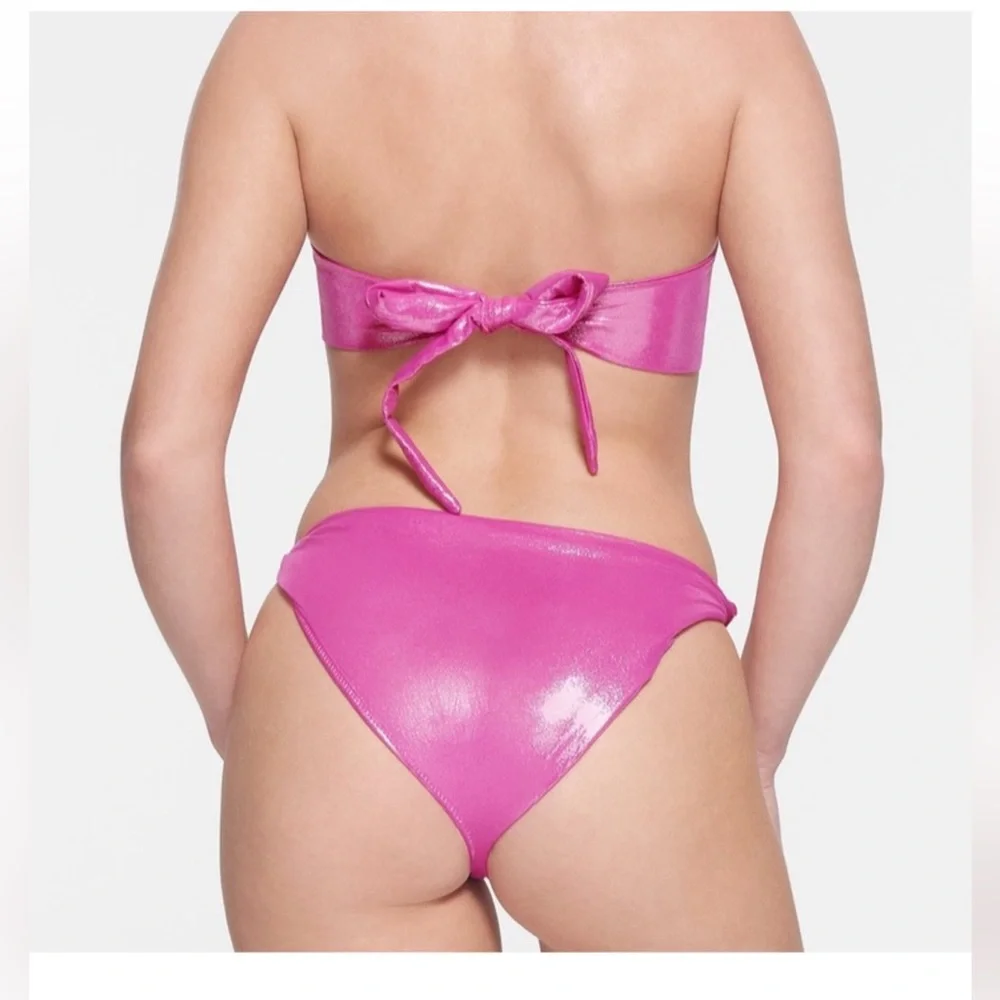 SKIMS Shimmer metallic Cutout One-Piece Swimsuit in Pink